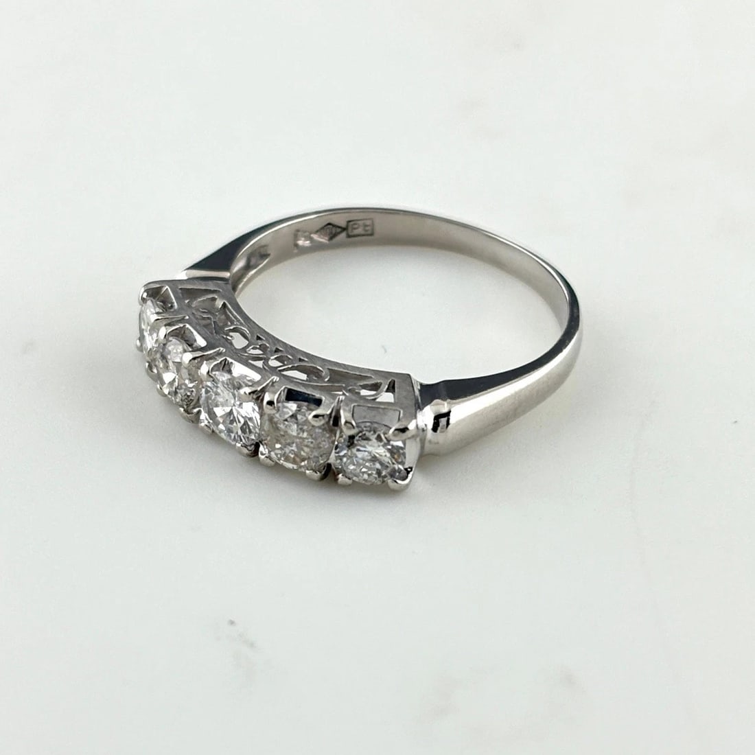 MELEE DIAMOND DESIGN RING: melee diamond design ring Brand: Unbranded Type/Style: Ring Material: Pt900, Main Stone Natural Color: Silver Size: US 7.5 to 8 Accessories: None Accessories Notice: When purchasing pre-owned goods,