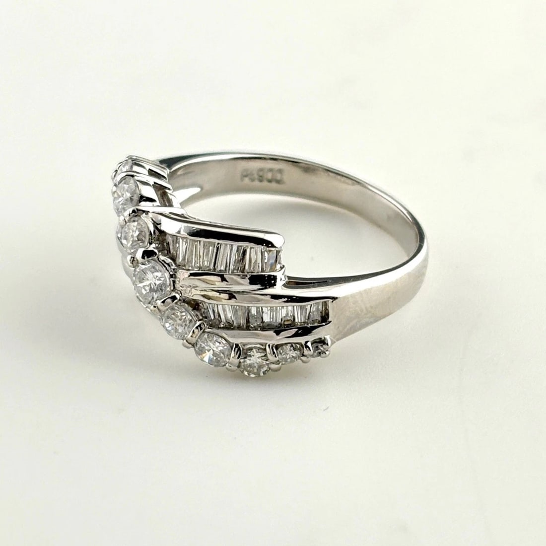MELEE DIAMOND DESIGN RING: melee diamond design ring Brand: Unbranded Type/Style: Ring Material: Pt900, Main Stone Natural Color: Silver Size: US 6.5 to 7 Accessories: None Accessories Notice: When purchasing pre-owned goods,