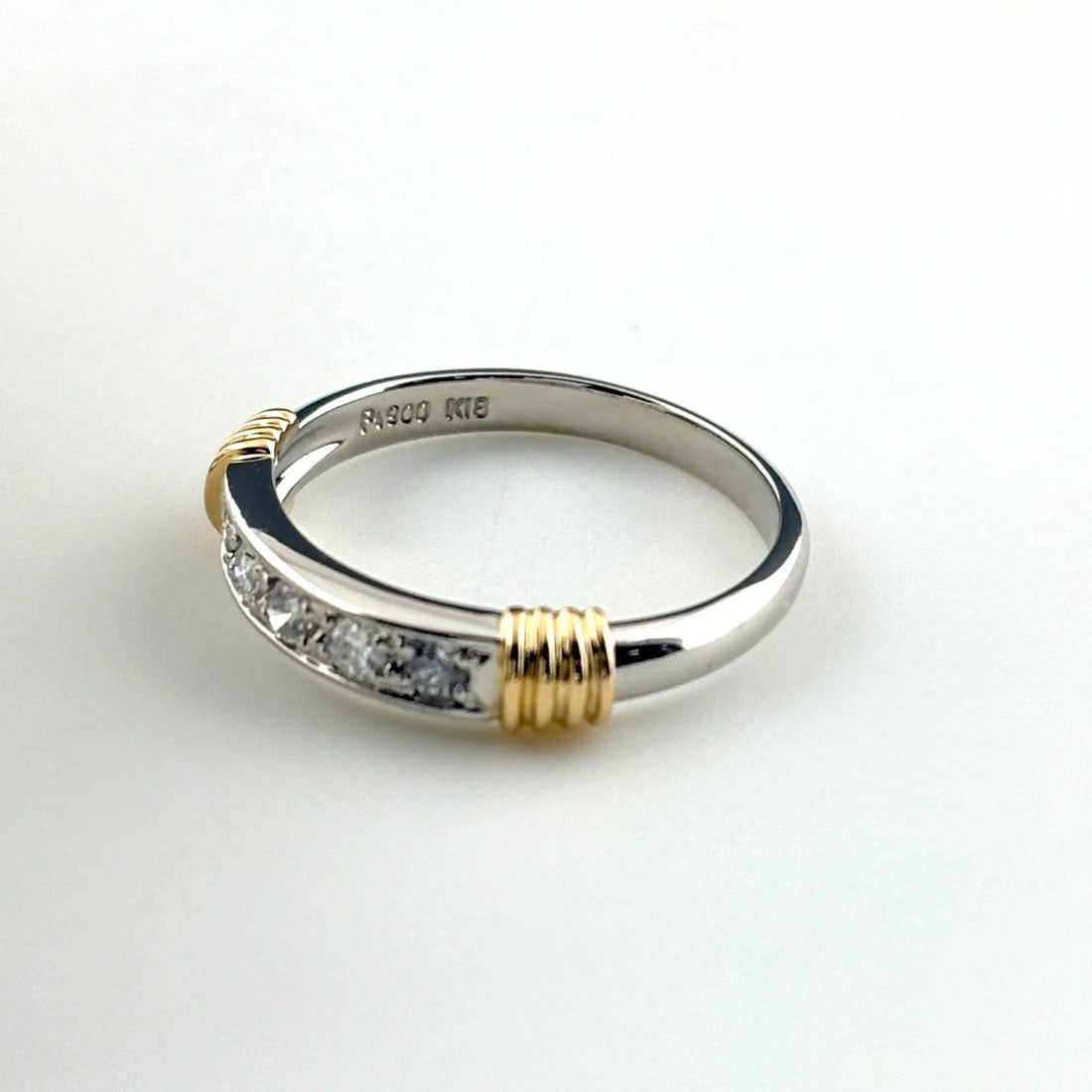 MELEE DIAMOND DESIGN RING: melee diamond design ring Brand: Unbranded Type/Style: Ring Material: Pt900 ?18K YG, Main Stone Natural Color: Platinum YG Size: US 6 to 6.5 Accessories: None Accessories Notice: When purchasing