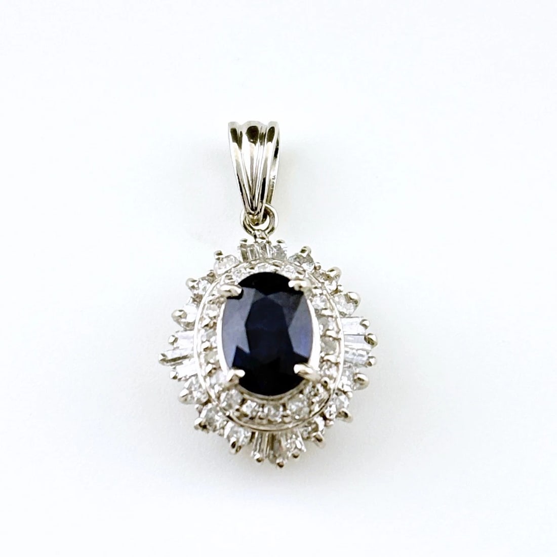 SAPPHIRE PENDANT HEAD PLATINUM: Sapphire Pendant Head Platinum Brand: Unbranded Type/Style: Pendant Head Material: Pt900, Main Stone sapphire Color: Silver Size: Total length of the pendant head including a bail 20.9 12.1mm(0.8")