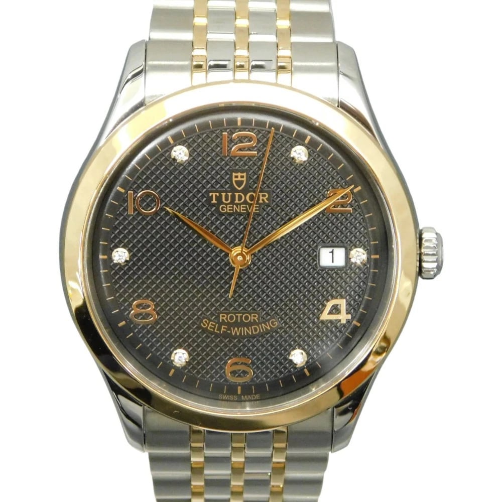 TUDOR WATCH AUTOMATIC 6 DIAMONDS DATE WATCH: Tudor Watch Automatic 6 Diamonds Date Watch Brand: TUDOR Type/Style: Wristwatch Material: Stainless steel and rose gold Color: BLACK Size: Case size: 39mm Wrist size: 17cm Accessories: None