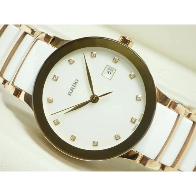 RADO WATCH CENTRIX WHITE DIAMOND WATCH: Rado Watch Centrix White Diamond Watch Brand: RADO Type/Style: Wristwatch Material: Stainless steel (Rose Gold PVD) Color: WHITE Size: Case size: 28mm Accessories: None Accessories Notice: