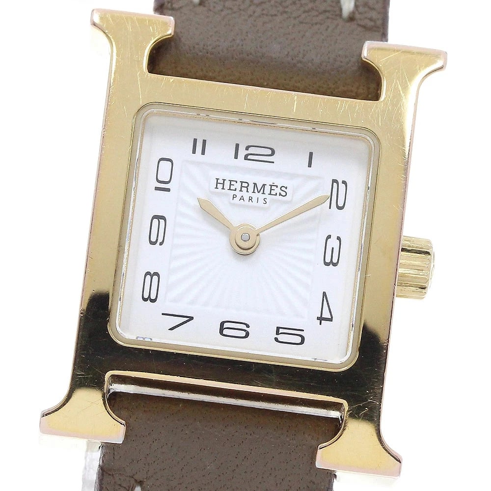 HERMES WATCH MINI QUARTZ WHITE DIAL STAINLE WATCH: Hermes Watch Mini Quartz White Dial Stainle Watch Brand: HERMES Type/Style: Wristwatch Material: SS/GP Color: WHITE DIAL Size: Case size: 17mm Wrist size: Approx. 15cm Accessories: None Accessories