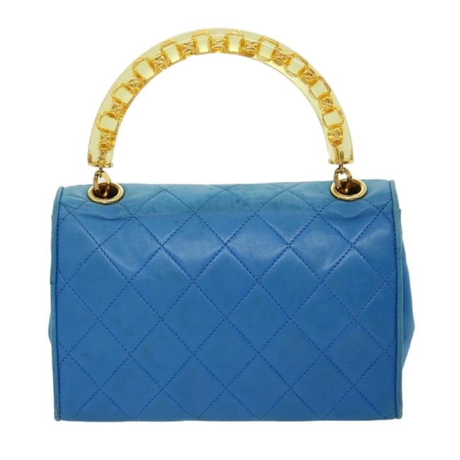 CHANEL HAND BAG LAMB SKIN BLUE: CHANEL Hand Bag Lamb Skin Blue Brand: CHANEL Type/Style: Hand Bag Material: Leather/Lamb Skin Color: blue Size: W7.7 x H5.1 x D2.4inch Accessories: None Accessories Notice: When purchasing