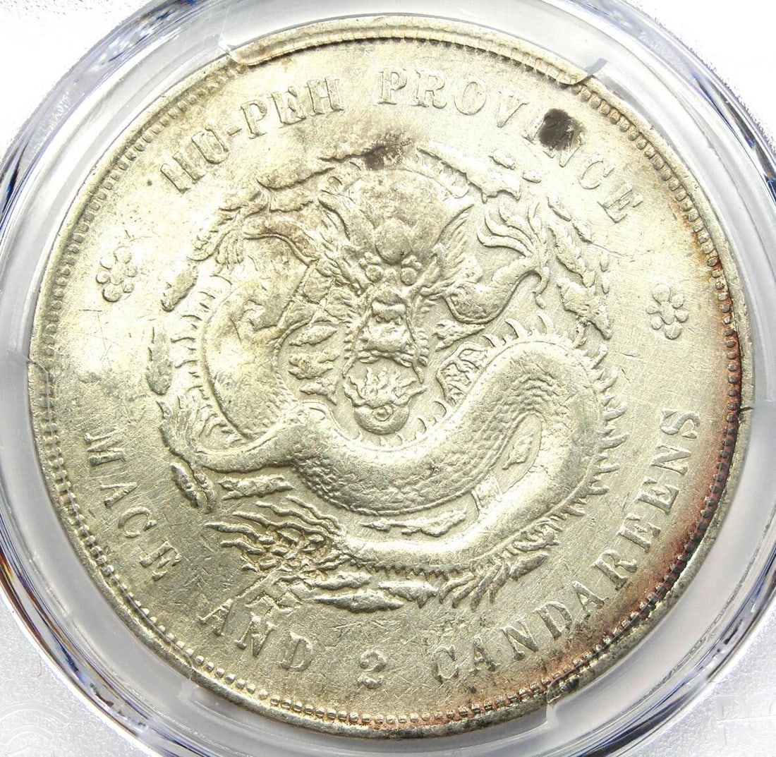 1909-11 CHINA HUPEH DRAGON SILVER DOLLAR $1 COIN: 1909-11 China Hupeh Dragon Silver Dollar $1 Coin Year: 1909 Denomination: $1 Country of Origin: China Accessories: None Accessories Notice: When purchasing pre-owned goods, please refer to the photos 