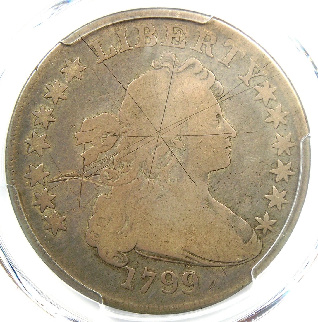 1799 DRAPED BUST SILVER DOLLAR $1 COIN: 1799 Draped Bust Silver Dollar $1 Coin Year : 1799 Denomination : $1 Country of Origin : United States Accessories: None Accessories Notice: When purchasing pre-owned goods, please refer to the