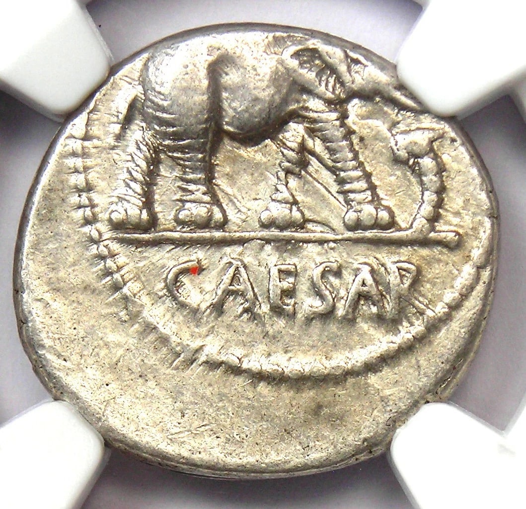 JULIUS CAESAR AR DENARIUS SILVER ELEPHANT COIN: Julius Caesar AR Denarius Silver Elephant Coin Year: 49 BC Denomination: Denarius Country of Origin: Italy Accessories: None Accessories Notice: When purchasing pre-owned goods, please refer to the ph