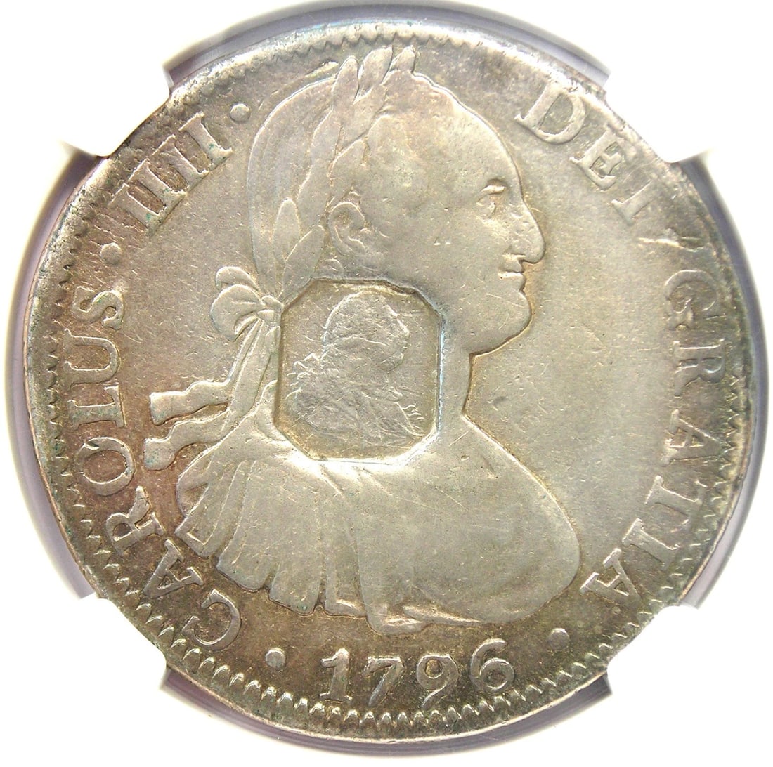 1799-1804 BRITAIN DOLLAR S$1 OCTAGONAL C/S ON MEXICO 8R COIN: 1799-1804 Britain Dollar S$1 Octagonal C/S on Mexico 8R Coin Year: 1799-1804 Denomination: S$1 Country of Origin: United Kingdom Accessories: None Accessories Notice: When purchasing pre-owned goods,