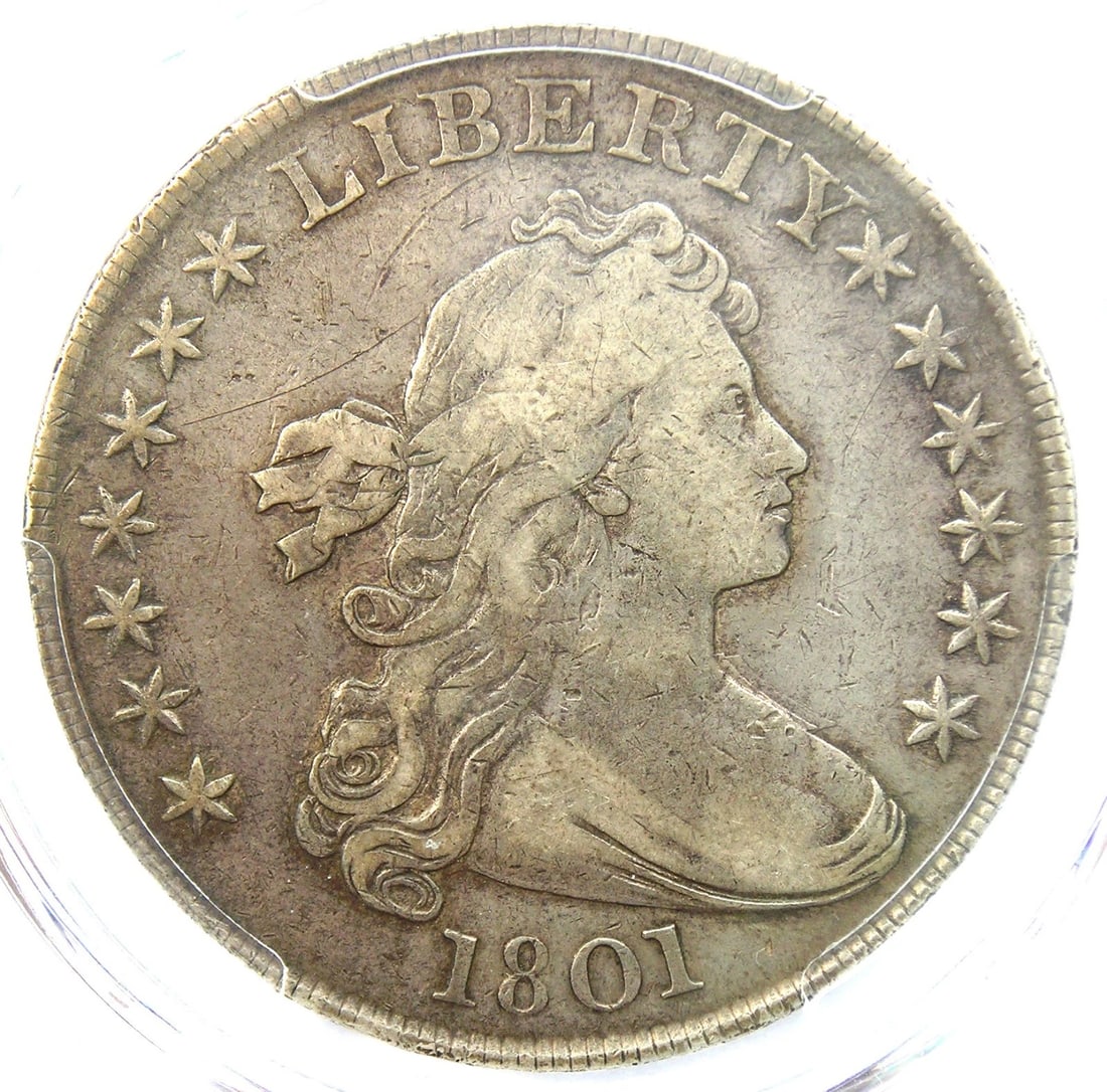 1801 DRAPED BUST SILVER DOLLAR $1 COIN: 1801 Draped Bust Silver Dollar $1 Coin Year : 1801 Denomination : $1 Country of Origin : United States Accessories: None Accessories Notice: When purchasing pre-owned goods, please refer to the photos