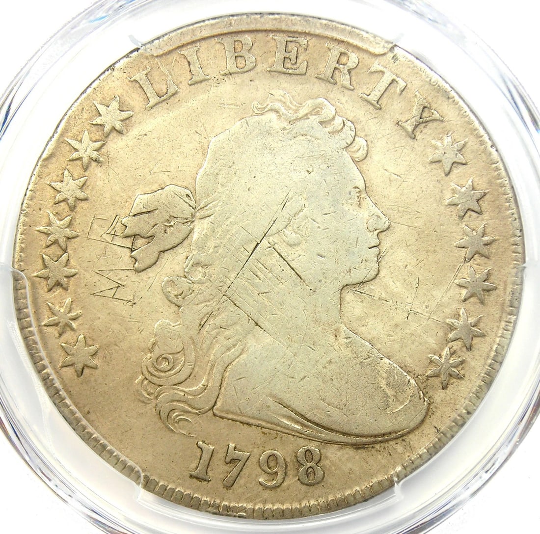 1798 DRAPED BUST SILVER DOLLAR $1 COIN: 1798 Draped Bust Silver Dollar $1 Coin Year : 1798 Denomination : $1 Country of Origin : United States Accessories: None Accessories Notice: When purchasing pre-owned goods, please refer to the photos
