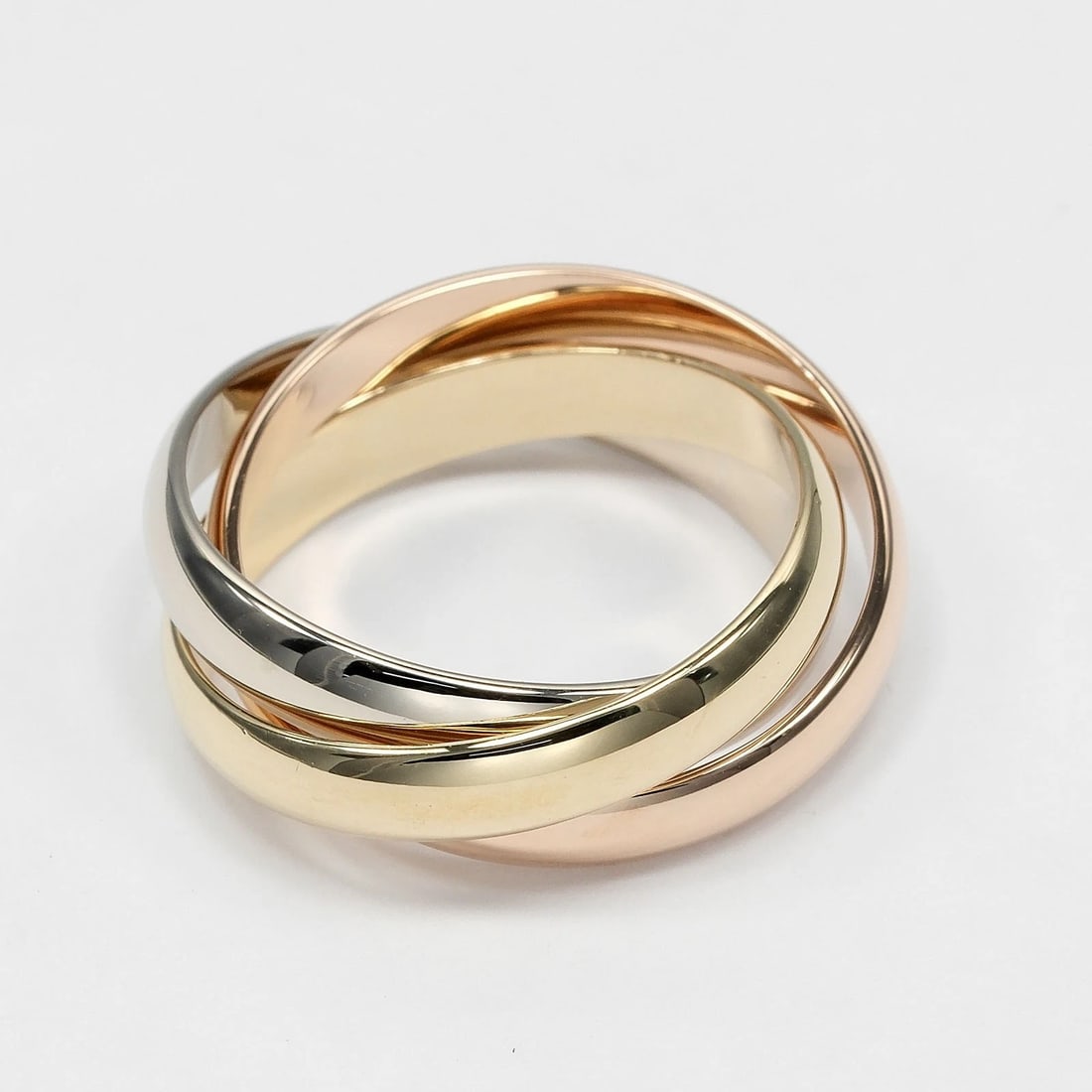 CARTIER TRINITY RING BAND K18 GOLD: CARTIER Trinity Ring band K18 Gold Brand: CARTIER Type/Style: Ring Material: K18 Gold (YGxPGxWG), Color: YGxPGxWG Size: 5.8(US Size) Accessories: None Accessories Notice: When purchasing pre-owned
