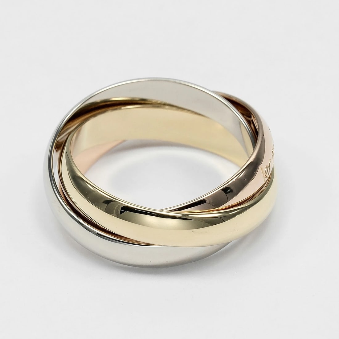 CARTIER TRINITY RING BAND K18 GOLD: CARTIER Trinity Ring band K18 Gold Brand: CARTIER Type/Style: Ring Material: K18 Gold (YGxPGxWG), Color: YGxPGxWG Size: 4.5(US Size) Accessories: None Accessories Notice: When purchasing pre-owned