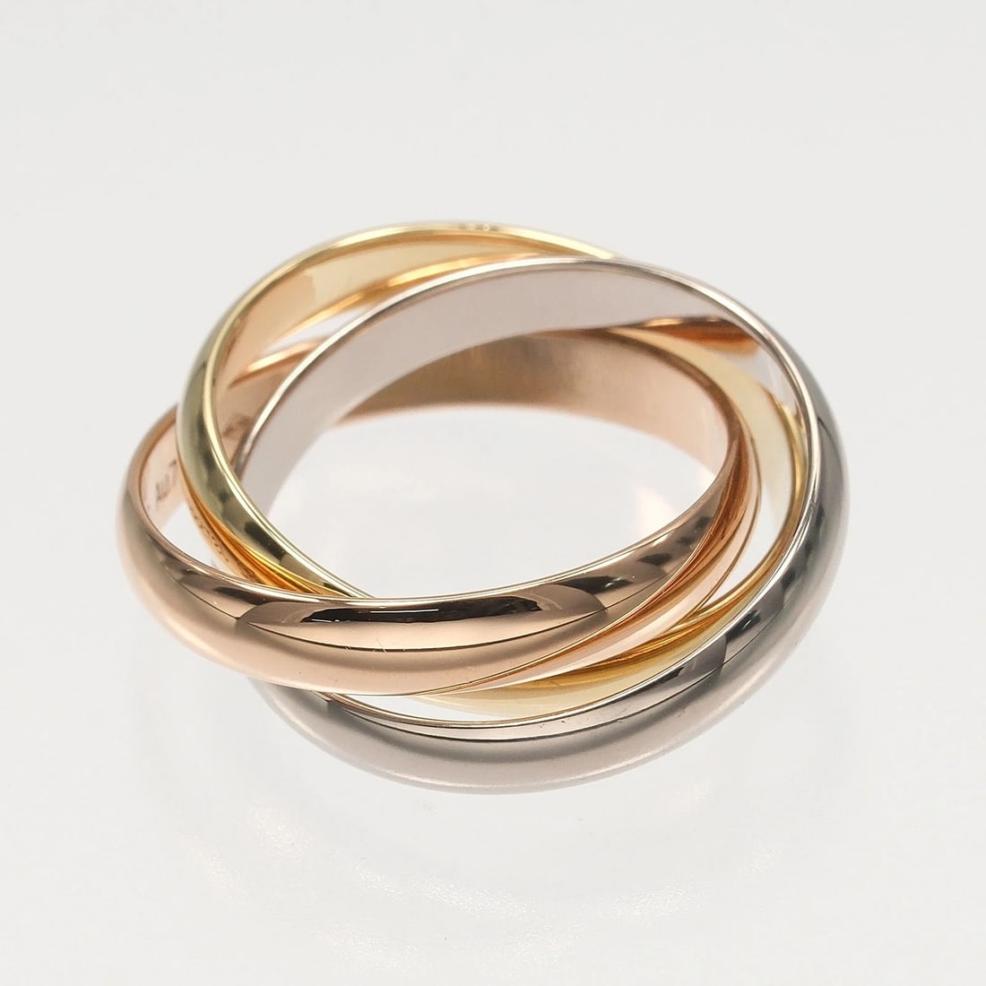 CARTIER TRINITY RING BAND K18 GOLD: CARTIER Trinity Ring band K18 Gold Brand: CARTIER Type/Style: Ring Material: K18 Gold (YGxPGxWG), Color: YGxPGxWG Size: 6.2(US Size) Accessories: None Accessories Notice: When purchasing pre-owned