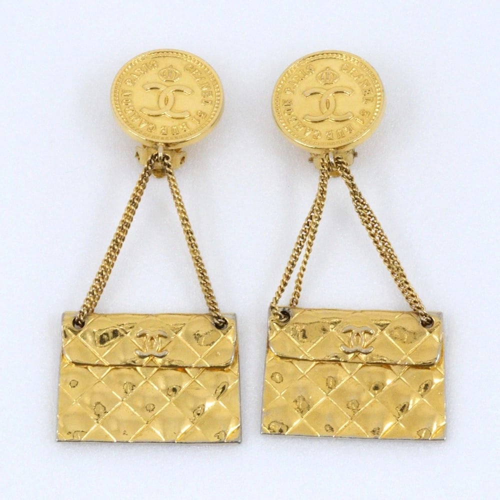 CHANEL BAG MOTIF EARRING: CHANEL Bag motif Earring Brand: CHANEL Type/Style: Earring Material: Plated Gold, Color: Gold Size: Size(CM) 79mm x 34mm Accessories: None Accessories Notice: When purchasing pre-owned goods, please