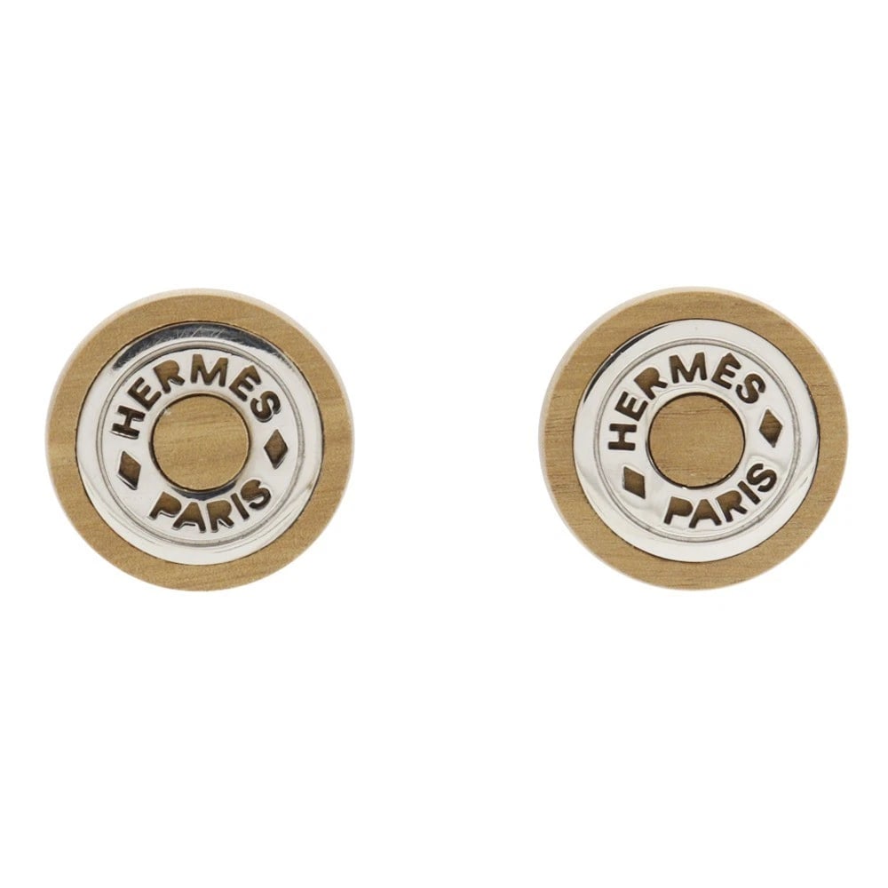 HERMES SERIE EARRING BROWN/SILVER WOOD/METALLIC: HERMES Serie Earring Brown/Silver Wood/metallic Brand: HERMES Type/Style: Earring Material: Wood / metallic, Color: Brown/Silver Size: Size(CM) 32mm x 32mm Accessories: None Accessories Notice: When