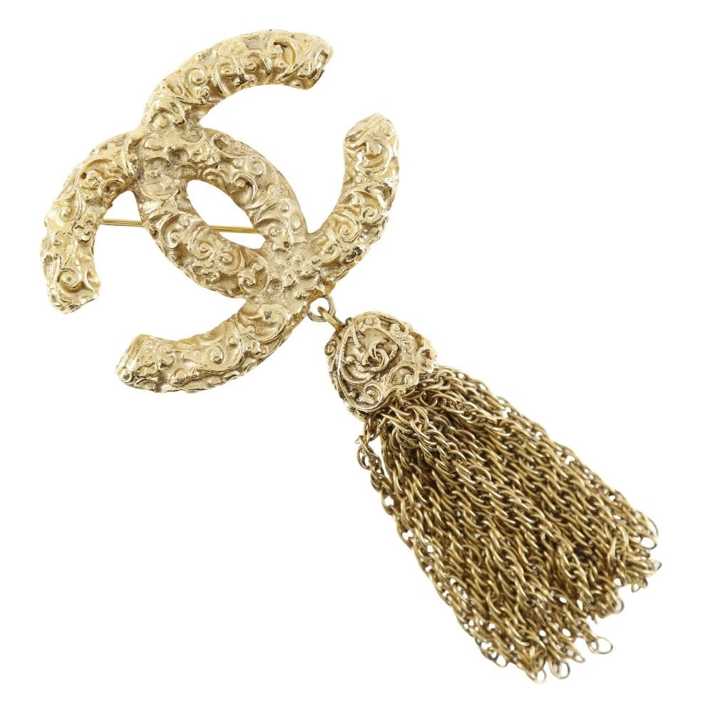 CHANEL COCO MARK BROOCH LAVA/FRINGE: CHANEL COCO Mark Brooch lava/fringe Brand: CHANEL Type/Style: Brooch Material: Plated Gold, Color: Gold Size: Size(CM) 87mm x 42mm Accessories: None Accessories Notice: When purchasing pre-owned