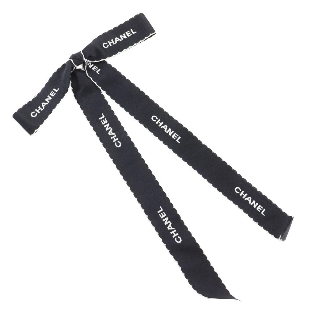 CHANEL RIBBON BROOCH LOGO: CHANEL ribbon Brooch logo Brand: CHANEL Type/Style: Brooch Material: Satin, Color: Black / white Size: Size(CM) 380mm x 225mm Accessories: None Accessories Notice: When purchasing pre-owned goods,
