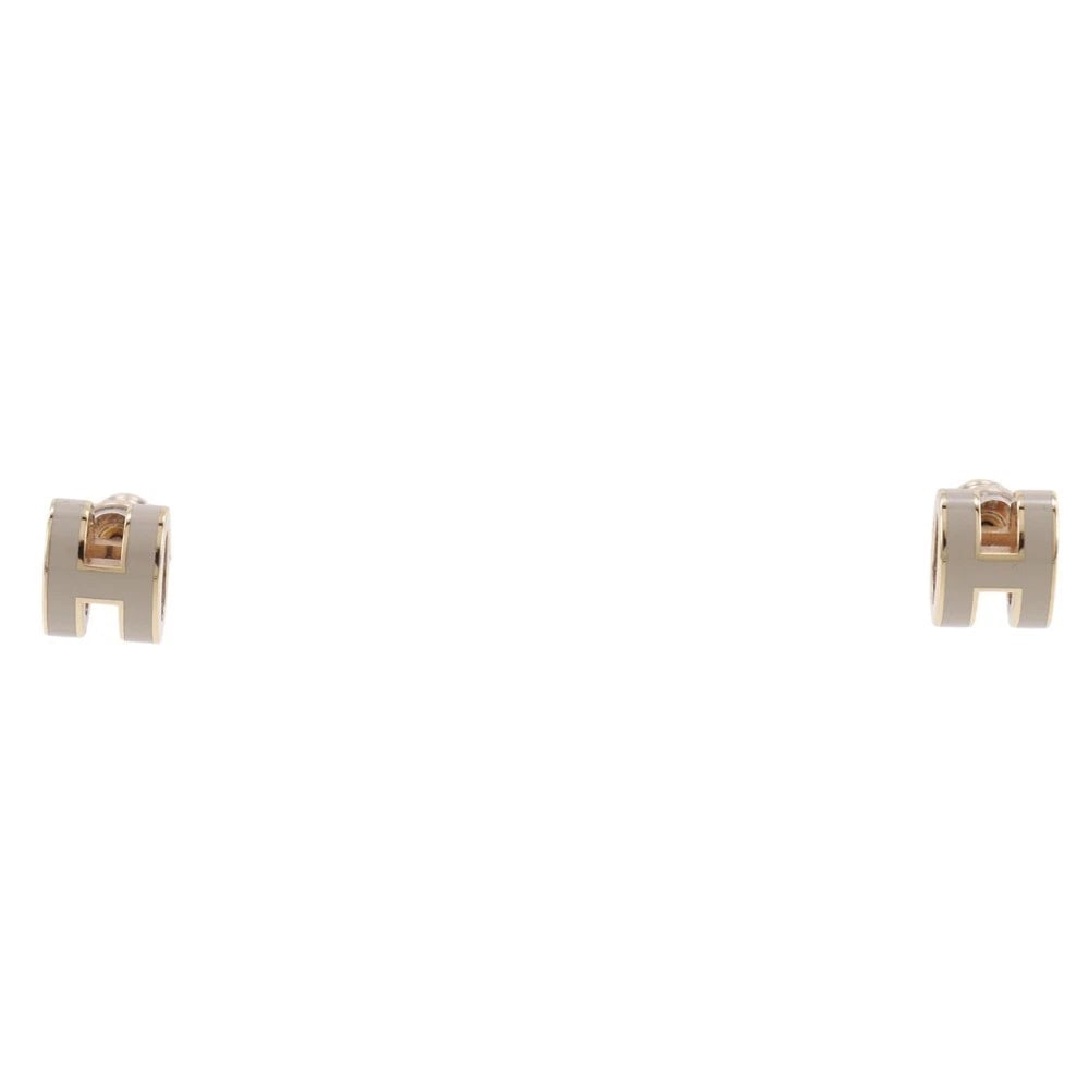 HERMES POP ASH MINI PIERCING: HERMES pop ash mini Piercing Brand: HERMES Type/Style: Piercing Material: lacquer, Color: Gurege Size: Size(CM) 7.9mm x 6.3mm Accessories: None Accessories Notice: When purchasing pre-owned goods,