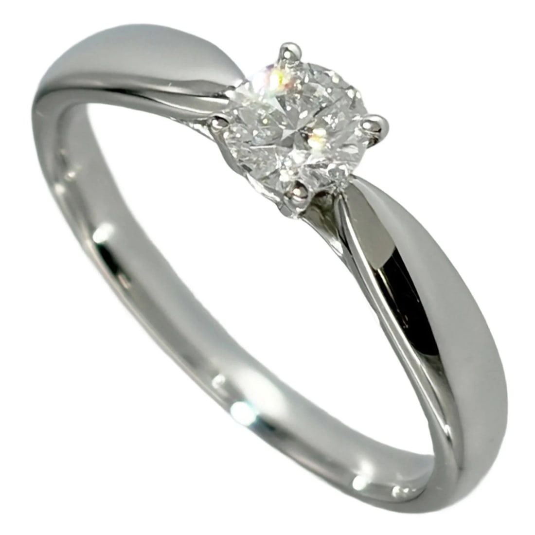 TIFFANY & CO. HARMONY SOLITAIRE RING, DIAMOND: Tiffany & Co. Harmony Solitaire Ring, Diamond Brand: Tiffany Type/Style: Band ring Material: Platinum 950, Main Stone Natural Color: Platinum Size: US 4 Accessories: None Accessories Notice: When