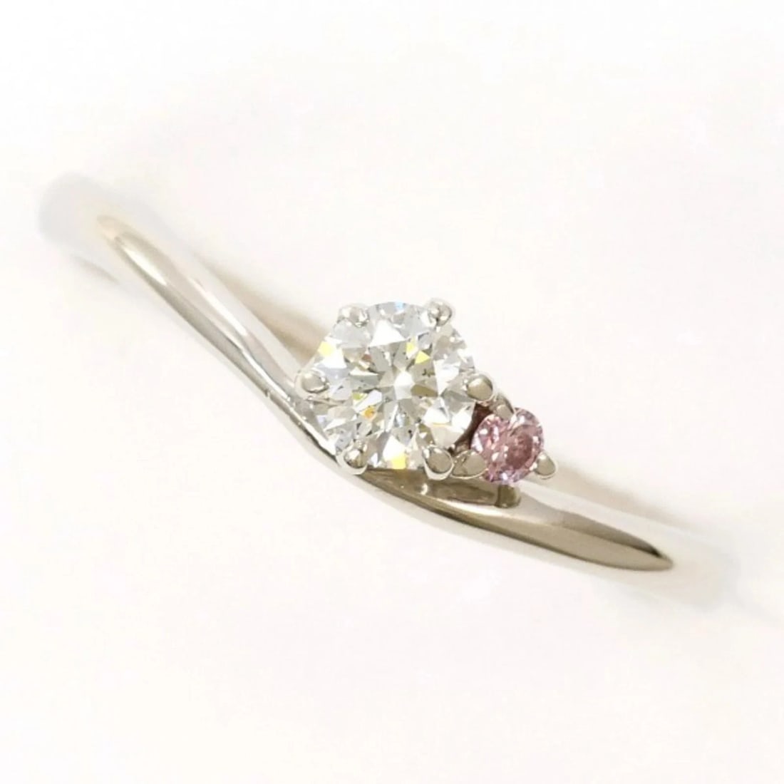 PT900 PLATINUM RING, DIAMOND: PT900 Platinum Ring, Diamond Brand: Unbranded Type/Style: Band ring Material: Platinum 900, Main Stone Natural Color: Size: US 3.5 Accessories: None Accessories Notice: When purchasing pre-owned