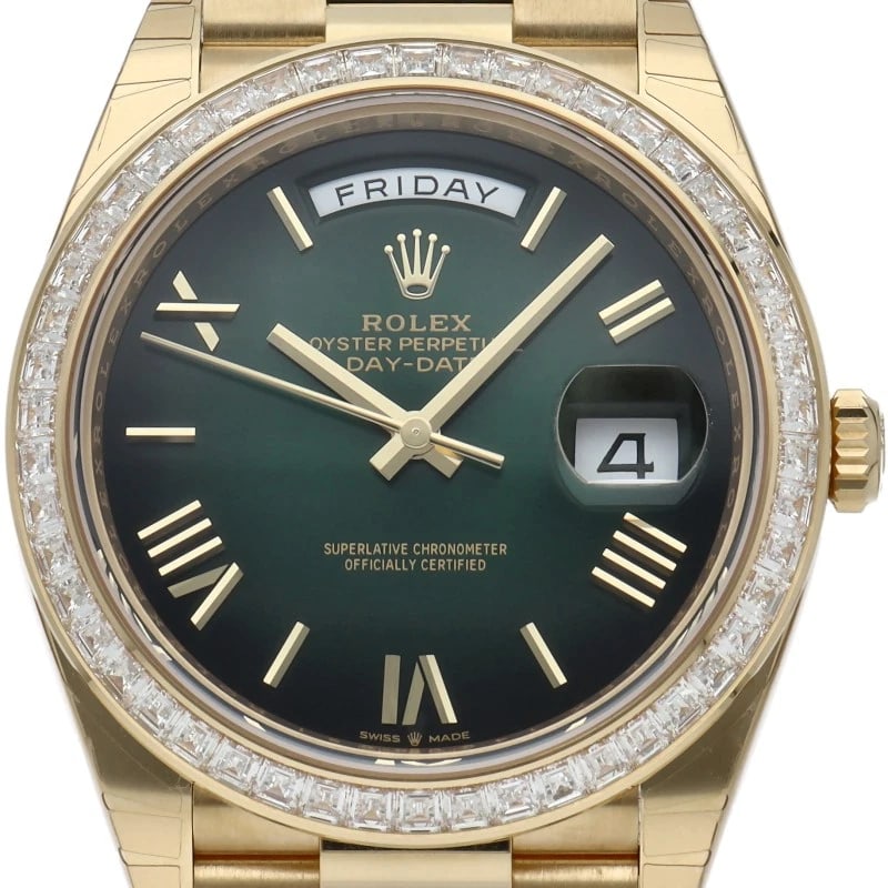 ROLEX DAY-DATE 40 WATCH WITH BUCKET DIAMOND BEZEL AND GREEN WATCH: ROLEx Day-Date 40 Watch with Bucket Diamond Bezel and Green Watch Brand: ROLEx Type/Style: Wristwatch Material: Band Material Yellow Gold, Case Material Yellow Gold Color: Dial Color Green ombre