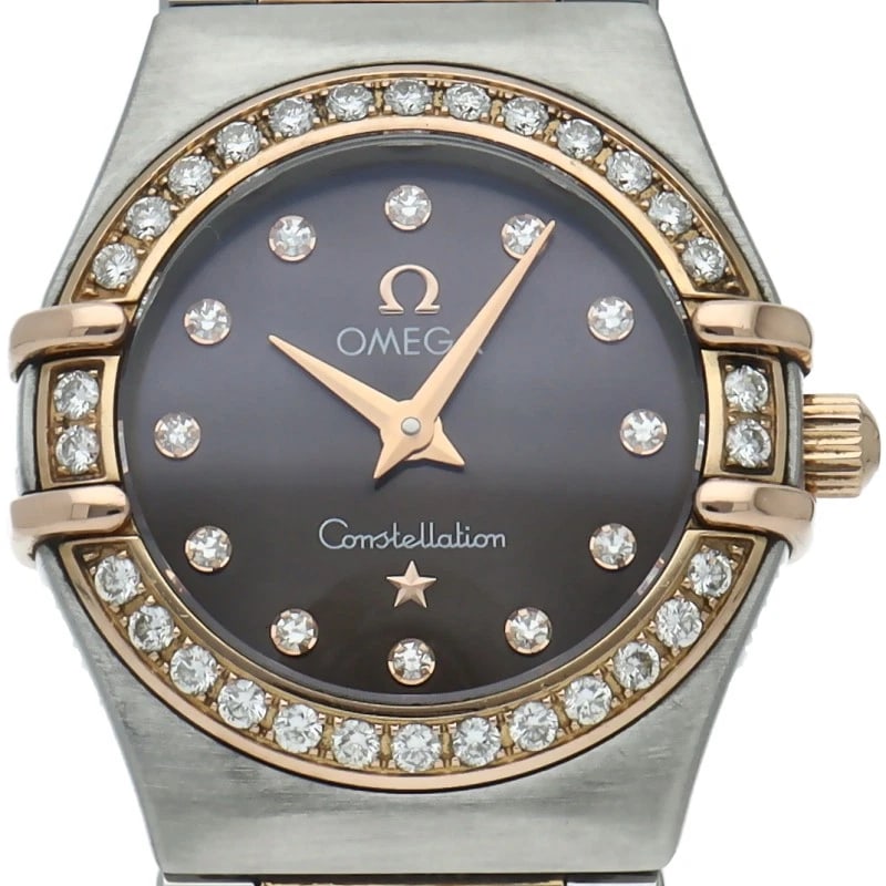 OMEGA CONSTELLATION MINI DIAMOND BEZEL DIAMOND WATCH: OMEGA Constellation Mini Diamond Bezel Diamond Watch Brand: OMEGA Type/Style: Wristwatch Material: Band Material Gold / steel, Case Material Gold / steel Color: Dial Color Brown Size: Case Diameter(H)
