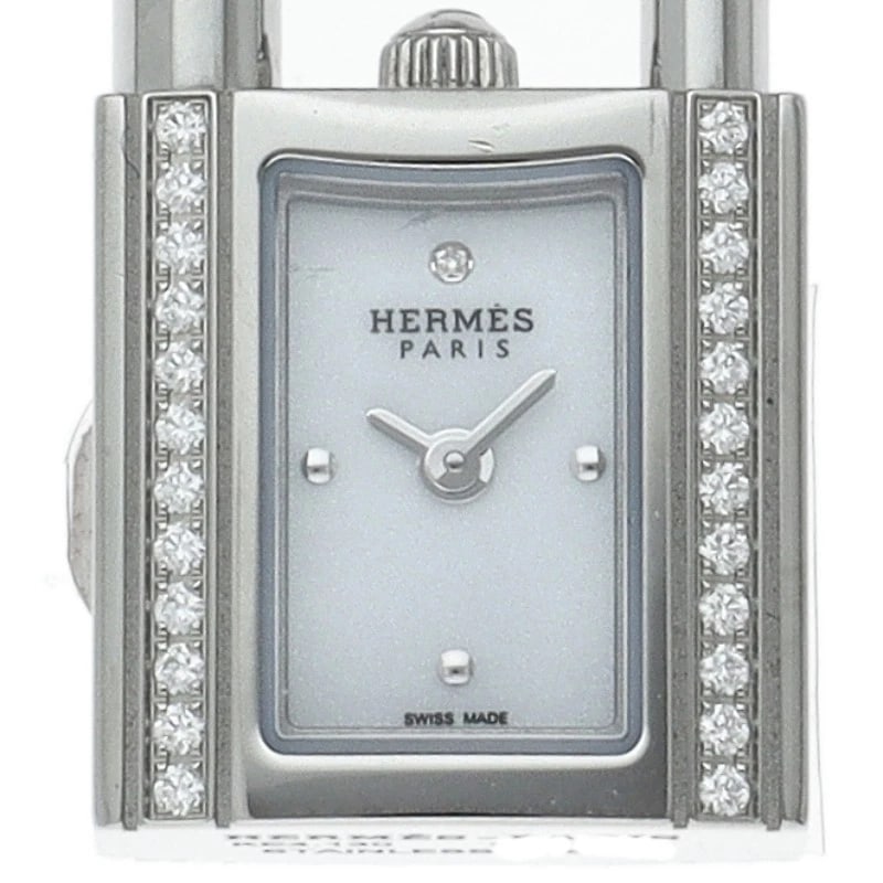 HERMES KELLY WATCH DIAMOND BEZEL STAINLESS WATCH: HERMES Kelly Watch Diamond Bezel Stainless Watch Brand: HERMES Type/Style: Wristwatch Material: Band Material Stainless steel, Case Material Stainless steel Color: Dial Color white Size: Case
