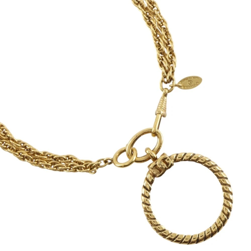 CHANEL LOUPE PENDANT NECKLACE: CHANEL Loupe Pendant Necklace Brand: CHANEL Type/Style: Necklace Material: Plated Gold, Color: Gold Size: Size(CM) Neck around?93.0cm Top?W42mm x H58mm Accessories: None Accessories Notice: When