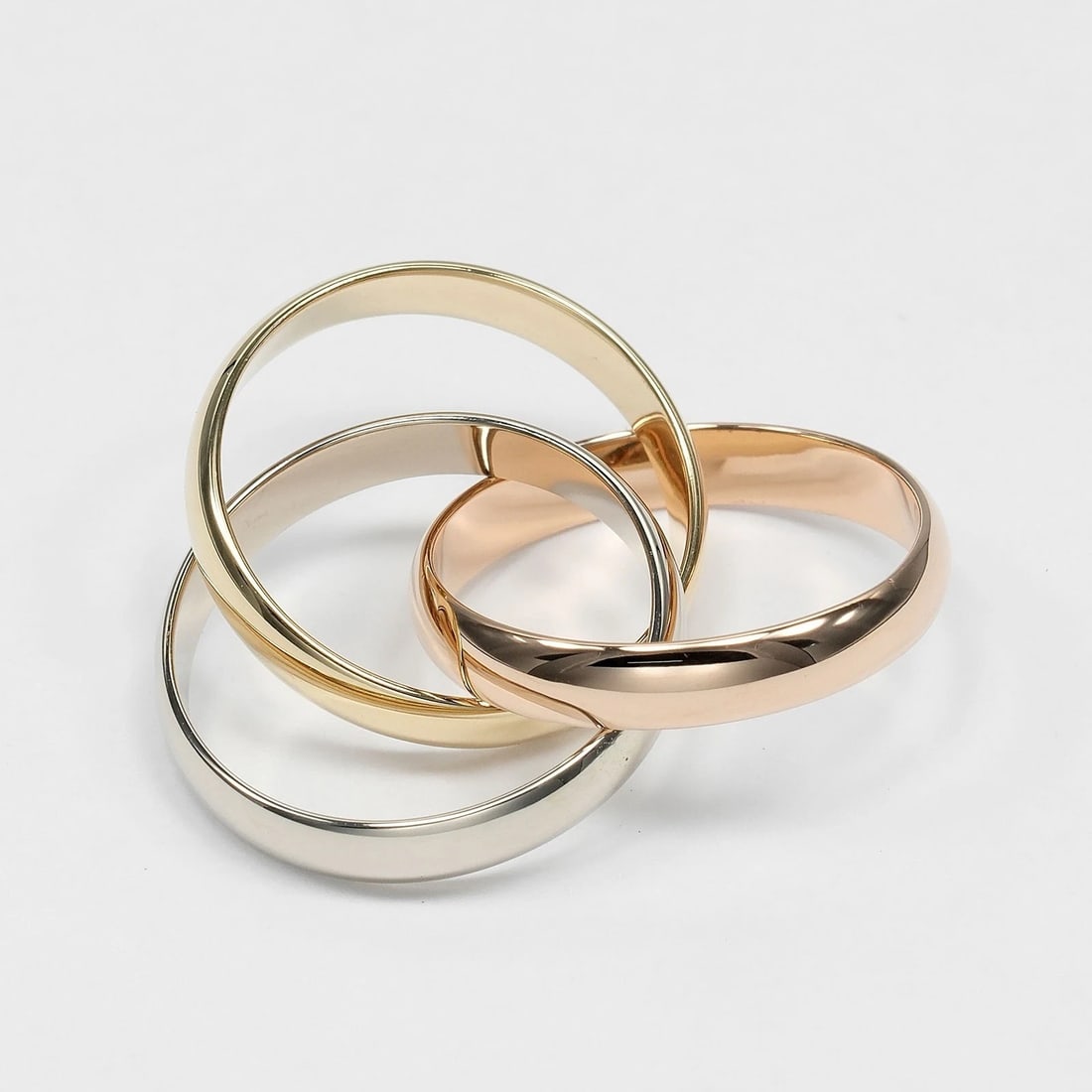 CARTIER TRINITY RING BAND K18 GOLD (YGXPGXWG): CARTIER Trinity Ring band K18 Gold (YGxPGxWG) Brand: CARTIER Type/Style: Ring Material: K18 Gold (YGxPGxWG), Color: YGxPGxWG Size: 4.3(US Size) Accessories: None Accessories Notice: When purchasing