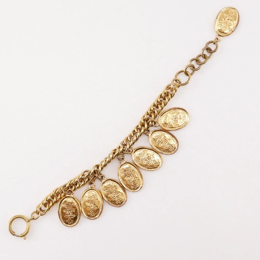 CHANEL MEDALLION CHARM BRACELET: CHANEL medallion charm Bracelet Brand: CHANEL Type/Style: Bracelet Material: Plated Gold, Color: Gold Size: Size(CM) All length?26.0cm Wrist circumference?19.0?23.0cm Accessories: None Accessories