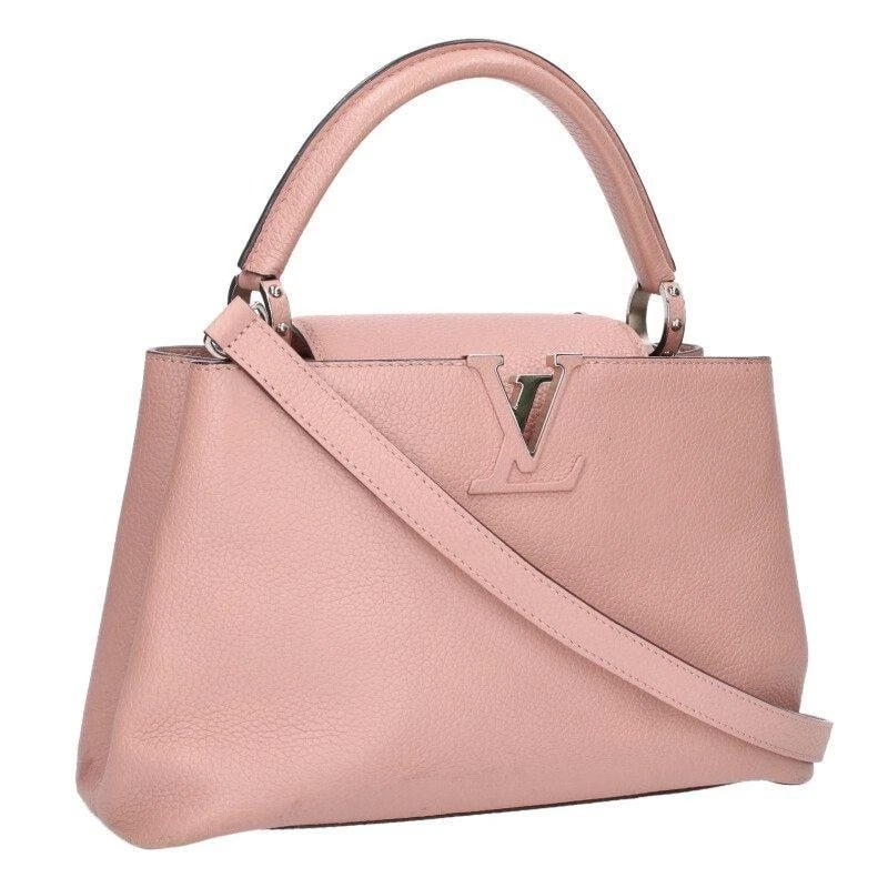 LOUIS VUITTON BAG: CAPUCINES PM PINK: LOUIS VUITTON Bag: Capucines PM Pink Brand: LOUIS VUITTON Type/Style: Satchel/Top Handle Bag Material: Exterior Material Leather Color: Exterior Color Pink Size: (approx. W11.8 ? H7.3 ? D3.9 inch)
