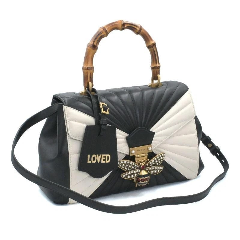 GUCCI BAG: QUEEN MARGARET BLACK/WHITE: GUCCI Bag: Queen Margaret Black/White Brand: GUCCI Type/Style: Top Handle Bag Material: Exterior Material Leather, Bamboo Color: Exterior Color Black/White Size: (approx. W12.6 ? H7.9 ? D3.9 inch)