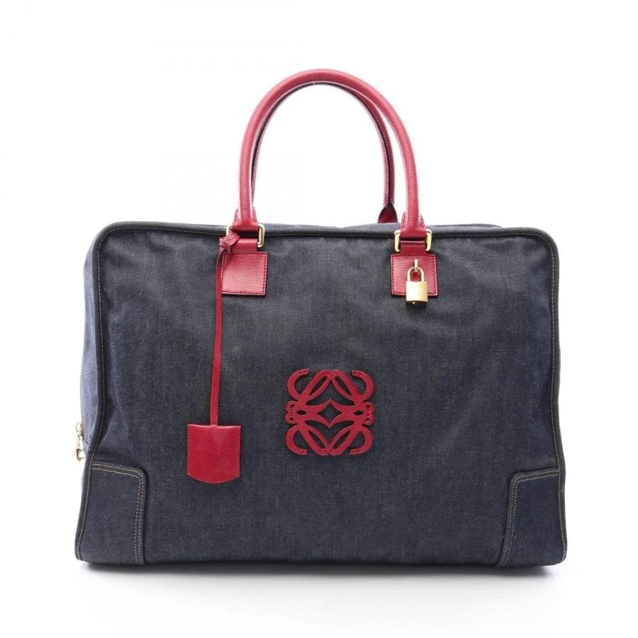 LOEWE BAG: AMAZONA 50 NAVY/BORDEAUX: LOEWE Bag: Amazona 50 Navy/Bordeaux Brand: LOEWE Type/Style: Duffle Material: Exterior Material Denim / Leather Color: Exterior Color Navy / Bordeaux Size: (approx. W19.7 ? H13.8 ? D8.3 inch)