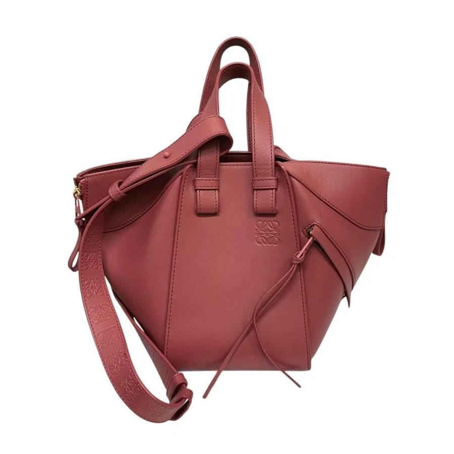 LOEWE BAG: HAMMOCK COMPACT SOLID PINK: LOEWE Bag: Hammock Compact Solid Pink Brand: LOEWE Type/Style: Shoulder Bag Material: Exterior Material Leather Color: Exterior Color Pink Size: (approx. W12.2 ? H8.3 ? D6.7 inch) Accessories: Non