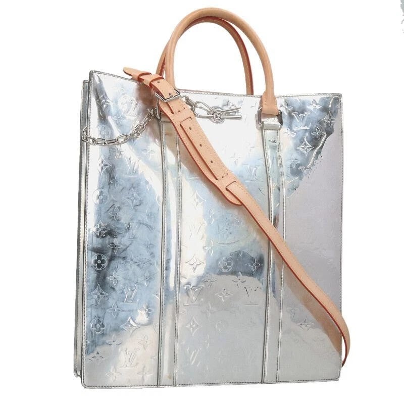 LOUIS VUITTON BAG: SAC PLAT SILVER: LOUIS VUITTON Bag: Sac Plat Silver Brand: LOUIS VUITTON Type/Style: Tote Material: Exterior Material Leather Color: Exterior Color Silver Size: (approx. W14.0 ? H15.6 ? D3.5 inch) Accessories: None