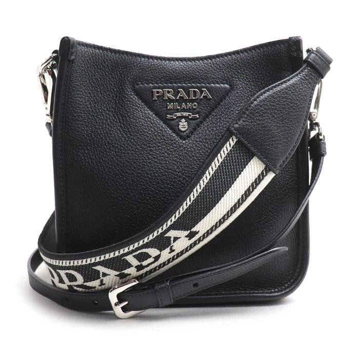 PRADA BAG: VITELLO DAINO BLACK W/DUST BAG STRAP: PRADA Bag: Vitello Daino Black w/dust bag strap Brand: PRADA Type/Style: Shoulder Bag Material: Exterior Material Leather Color: Exterior Color Black Size: (approx. W7.5 ? H7.5 ? D2.4 inch)