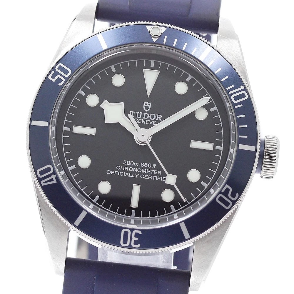 TUDOR HERITAGE BLACK AUTOMATIC WATCH: TUDOR Heritage black Automatic Watch Brand: TUDOR Type/Style: Wristwatch Material: Band Material rubber, Case Material Stainless Steel Color: Case Color Silver Band Color Navy Dial Color black Size:
