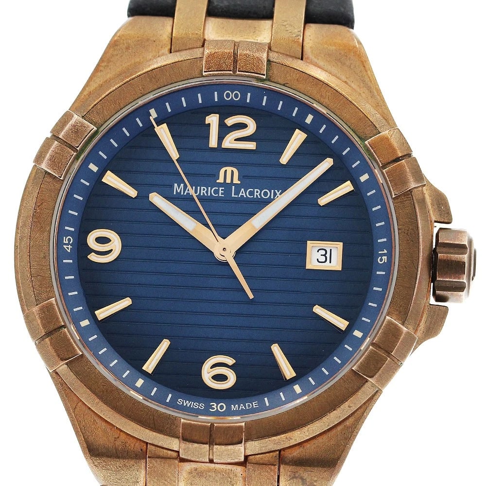 MAURICE LACROIX ICON BRONZE QUARTZ WATCH: MAURICE LACROIx Icon Bronze Quartz Watch Brand: MAURICE LACROIx Type/Style: Wristwatch Material: Band Material leather, Case Material Stainless Steel / Bronze Color: Dial Color Navy Band Color black