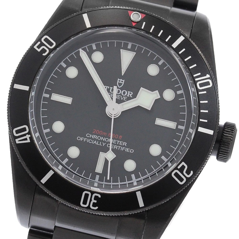 TUDOR HERITAGE BLACK AUTOMATIC WATCH: TUDOR Heritage Black Automatic Watch Brand: TUDOR Type/Style: Wristwatch Material: Band Material Stainless Steel, Case Material Stainless Steel Color: Case Color black Band Color black Dial Color