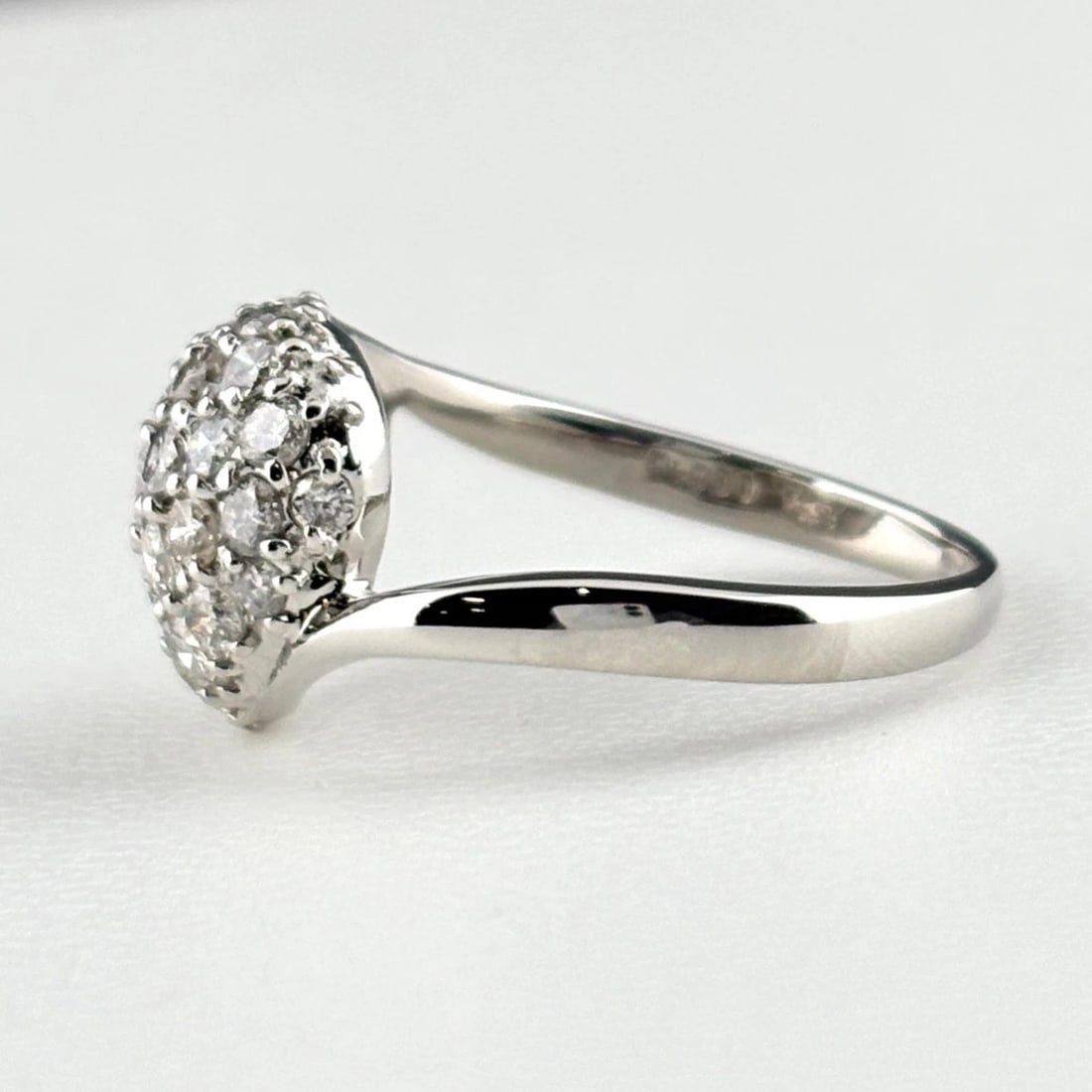 HEART MOTIF DESIGN RING PLATINUM MELEE DIAMOND RING: Heart Motif Design Ring Platinum Melee Diamond Ring Brand: Unbranded Type/Style: Ring Material: Pt900, Main Stone Natural Color: None Size: US7 to 7.5 Accessories: None Accessories Notice: