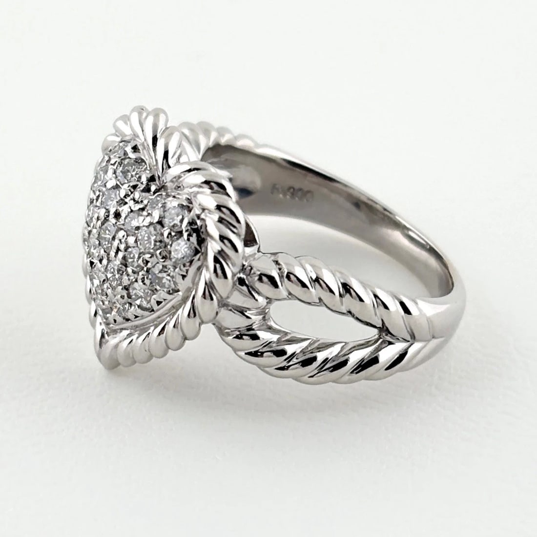 HEART MOTIF DESIGN RING PLATINUM MELEE DIAMOND RING: Heart Motif Design Ring Platinum Melee Diamond Ring Brand: Unbranded Type/Style: Ring Material: Pt900, Main Stone Natural Color: None Size: US5.5 to 6 Accessories: None Accessories Notice: When