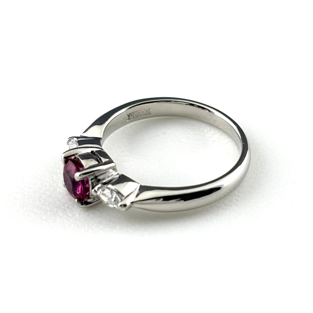 RUBY DESIGN RING PLATINUM MELEE DIAMOND RING: Ruby Design Ring Platinum Melee Diamond Ring Brand: Unbranded Type/Style: Ring Material: Pt900, Main Stone Ruby /Secondary Stone:Natural Color: None Size: US6 to 6.5 Accessories: None Acce