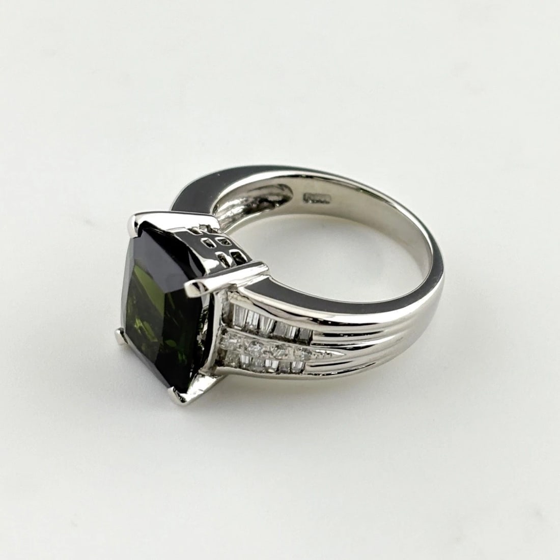 GREEN TOURMALINE DESIGN RING PLATINUM MELEE RING: Green Tourmaline Design Ring Platinum Melee Ring Brand: Unbranded Type/Style: Ring Material: Pt900, Main Stone Tourmaline /Secondary Stone:Natural Color: None Size: US6.5 Accessories: None