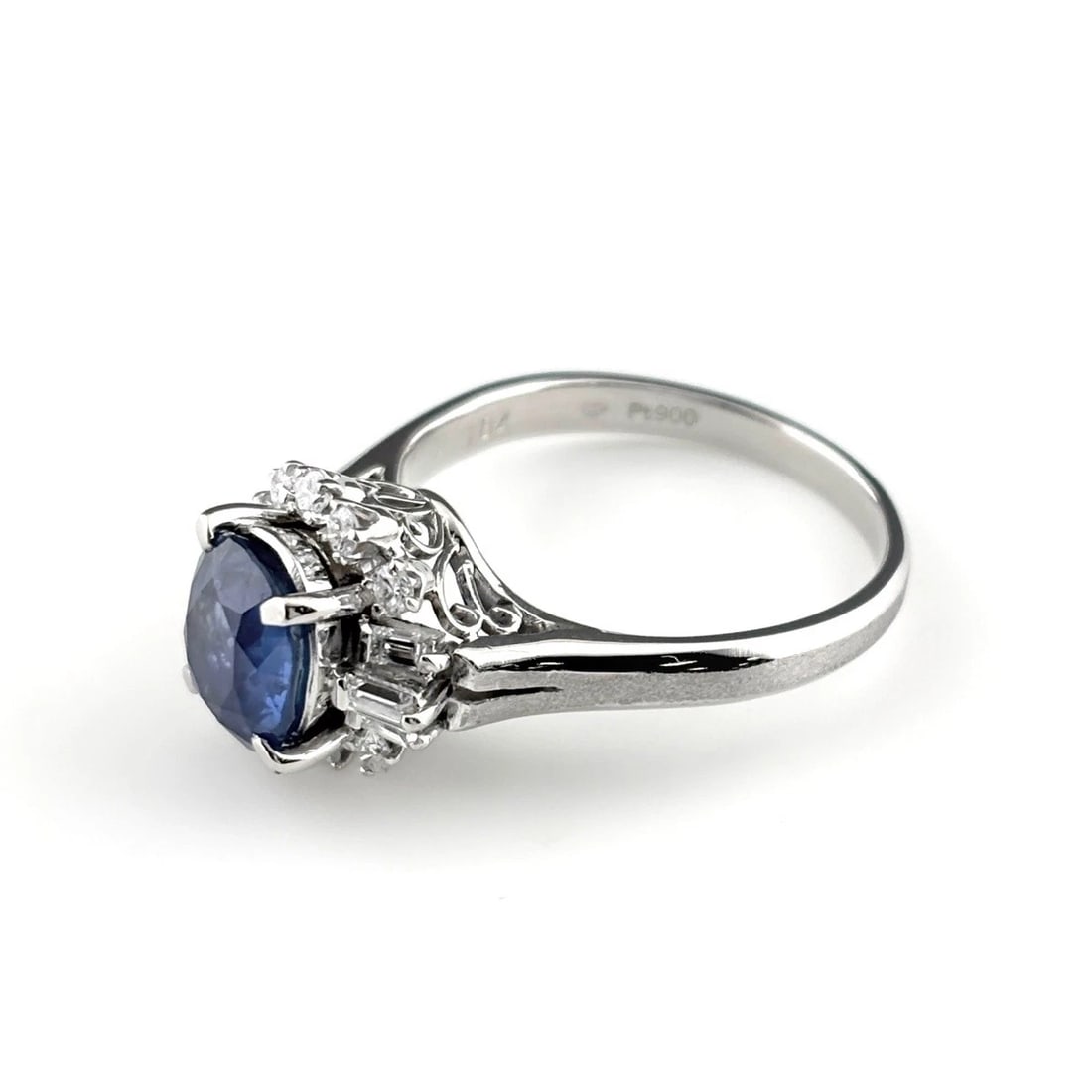 SAPPHIRE DESIGN RING PLATINUM MELEE DIAMOND RING: Sapphire Design Ring Platinum Melee Diamond Ring Brand: Unbranded Type/Style: Ring Material: Pt900, Main Stone Sapphire /Secondary Stone:Natural Color: None Size: US7 to 7.5 Accessories: None