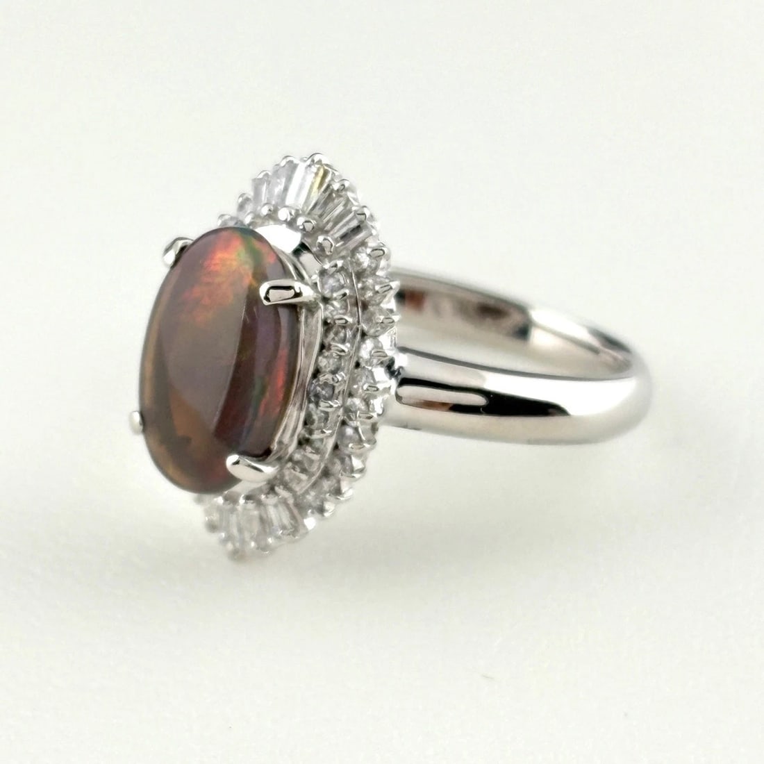 BLACK OPAL DESIGN RING PLATINUM MELEE DIAMOND RING: Black Opal Design Ring Platinum Melee Diamond Ring Brand: Unbranded Type/Style: Ring Material: Pt900, Main Stone Opal /Secondary Stone:Natural Color: None Size: US5 to 5.5 Accessories: None
