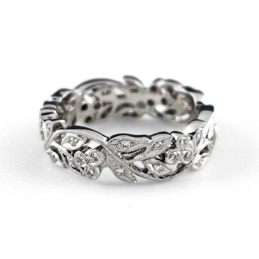 FLOWER MOTIF DESIGN RING MELEE DIAMOND BOTANICAL RING: Flower Motif Design Ring Melee Diamond Botanical Ring Brand: Unbranded Type/Style: Ring Material: 750, Main Stone Natural Color: None Size: US6.5 Accessories: None Accessories Notice: When