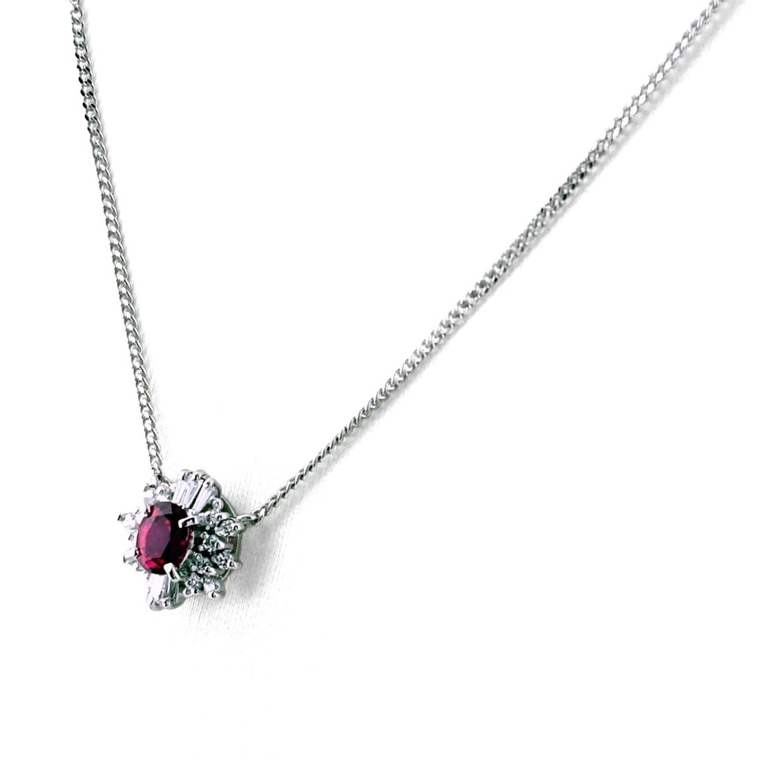 RUBY PLATINUM PENDANT MELEE DIAMOND NECKLACE: Ruby Platinum Pendant Melee Diamond Necklace Brand: Unbranded Type/Style: Necklace Material: Pt900, Main Stone Ruby /Secondary Stone:Natural Color: None Size: 9.5x9.2mm(0.4") Accessories: None