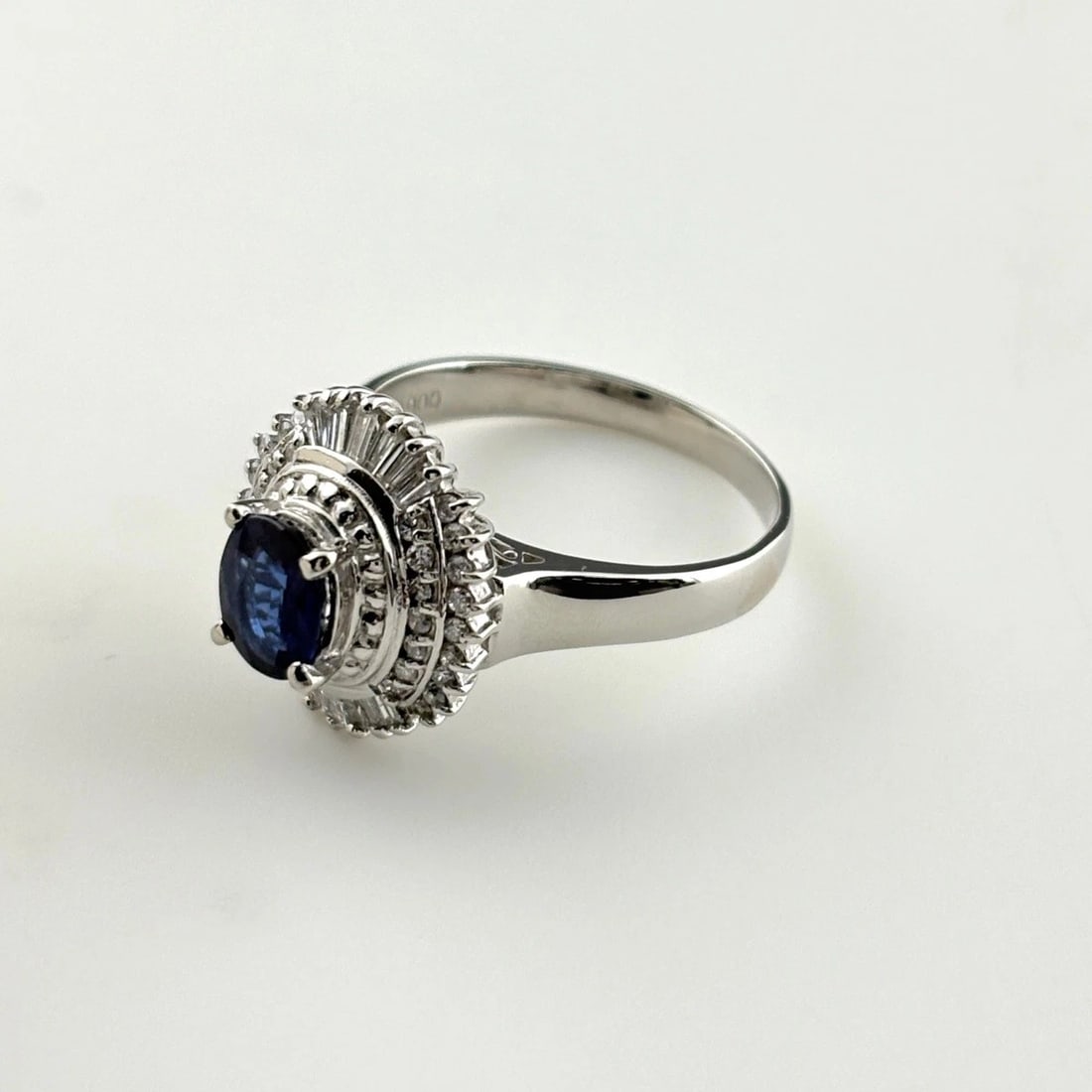 SAPPHIRE DESIGN RING PLATINUM MELEE DIAMOND RING: Sapphire Design Ring Platinum Melee Diamond Ring Brand: Unbranded Type/Style: Ring Material: Pt900, Main Stone Sapphire /Secondary Stone:Natural Color: None Size: US8 to 8.5 Accessories: None