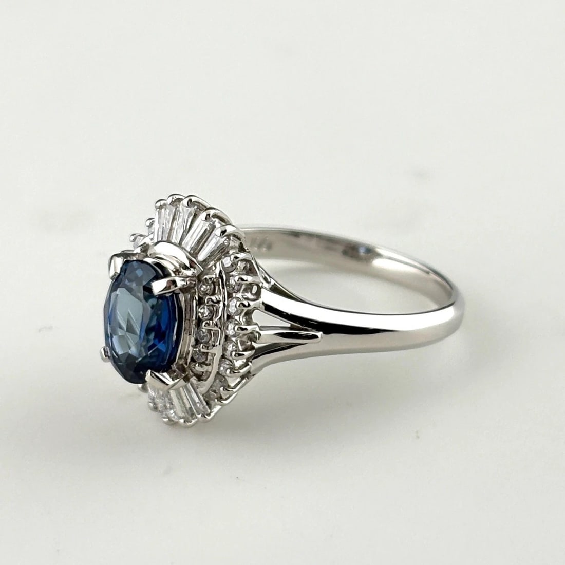 SAPPHIRE DESIGN RING PLATINUM MELEE DIAMOND RING: Sapphire Design Ring Platinum Melee Diamond Ring Brand: Unbranded Type/Style: Ring Material: Pt900, Main Stone Sapphire /Secondary Stone:Natural Color: None Size: US6.5 to 7 Accessories: None