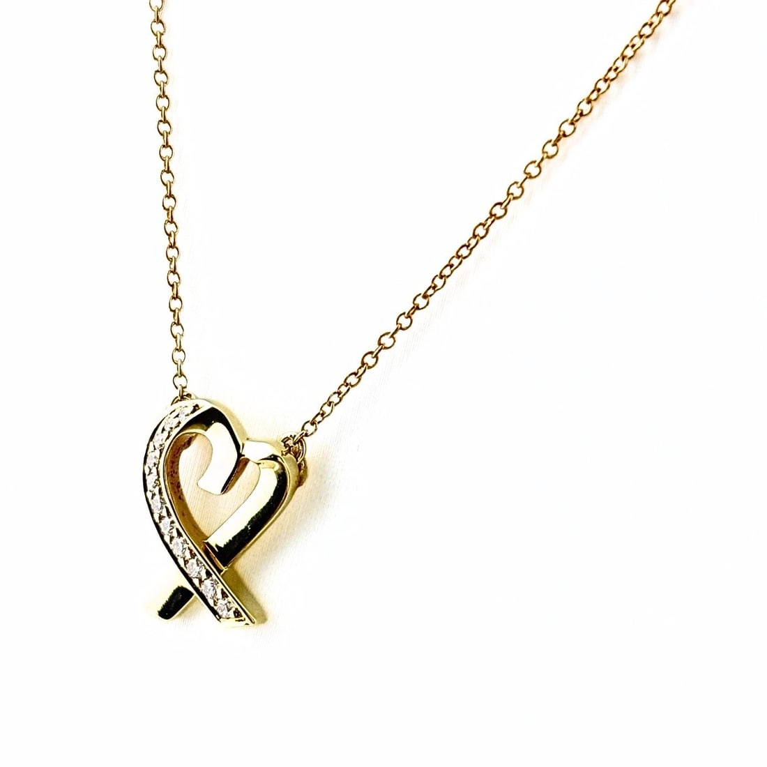 TIFFANY&CO. RUBBING HEART DIAMOND NECKLACE PENDANT: Tiffany&Co. Rubbing Heart Diamond Necklace Pendant Brand: TIFFANY&Co. Type/Style: Necklace Material: 750 YG, Main Stone Ruby /Secondary Stone:Natural Color: YG Size: 15.1x11.56mm(0.6") Accessories: